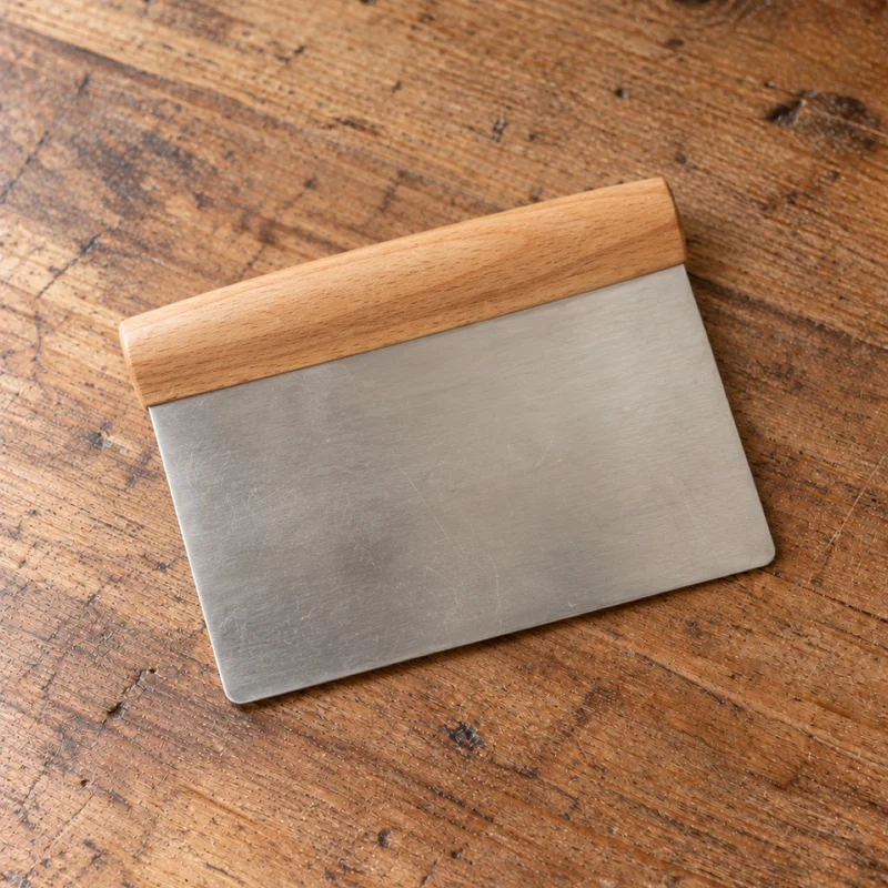 Deegsteker met houten greep
